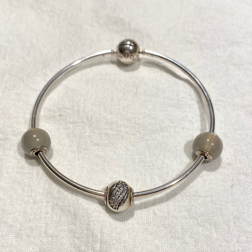 Pandora Essence bracelet with 3 charms